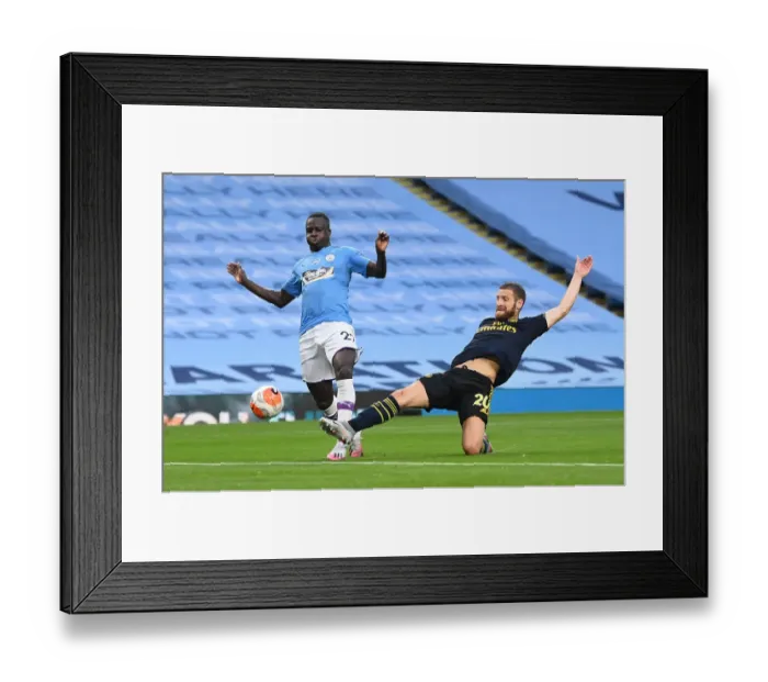 Framed Print : Mustafi vs Mendy: Intense Battle in Manchester City vs Arsenal FC Premier League Clash