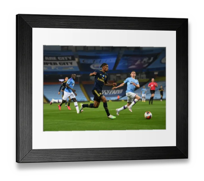 Framed Print : Reiss Nelson vs Phil Foden: Battle at the Etihad - Manchester City vs Arsenal FC, Premier League 2019-2020