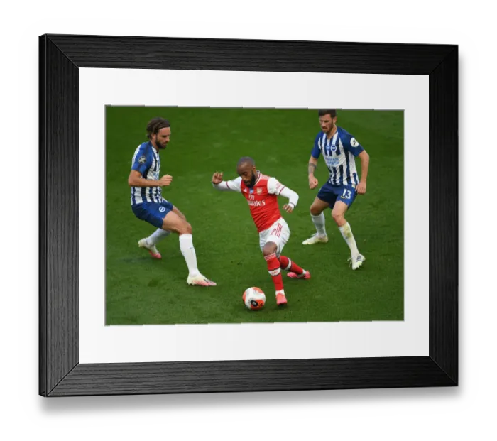 Framed Print : Brighton vs. Arsenal: Lacazette Faces Off Against Propper and Gross