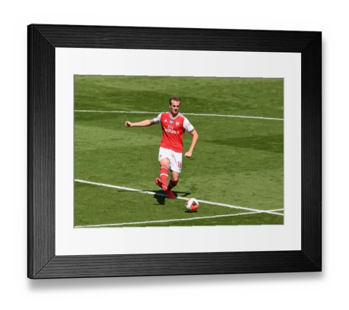 Framed Print : Rob Holding in Action: Arsenal's Defensive Battle against Brighton & Hove Albion, Premier League 2019-2020 Framed Print : Rob Holding in Action: Arsenal's Defensive Battle against Brighton & Hove Albion, Premier League 2019-2020
