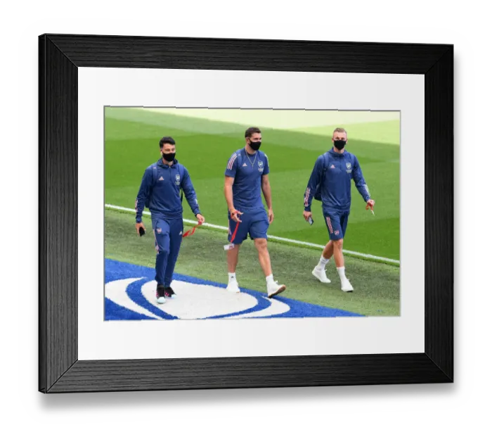 Framed Print : Arsenal Players Arrive at Brighton & Hove Albion Stadium for Premier League Showdown (2020)