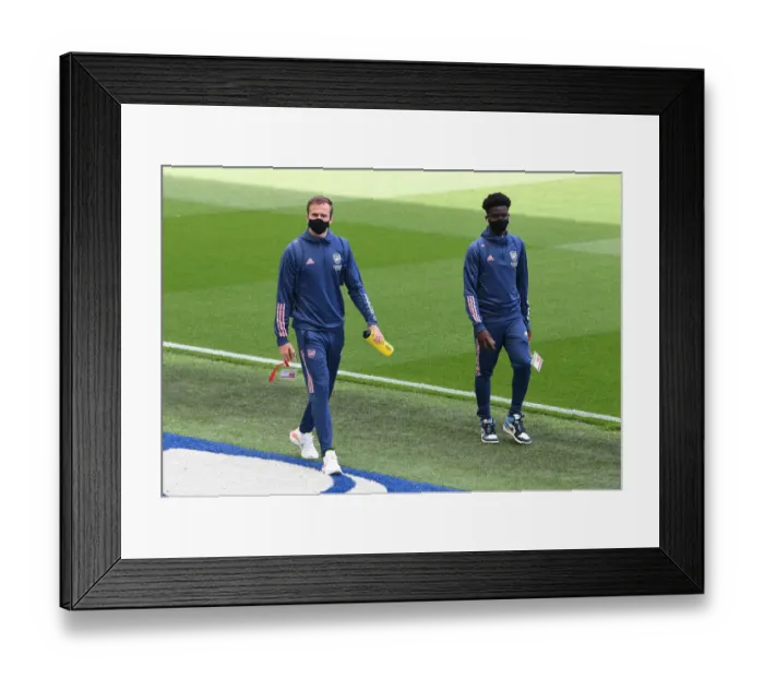 Framed Print : Arsenal Players Arrive at Brighton & Hove Albion Stadium before Premier League Clash (2020)