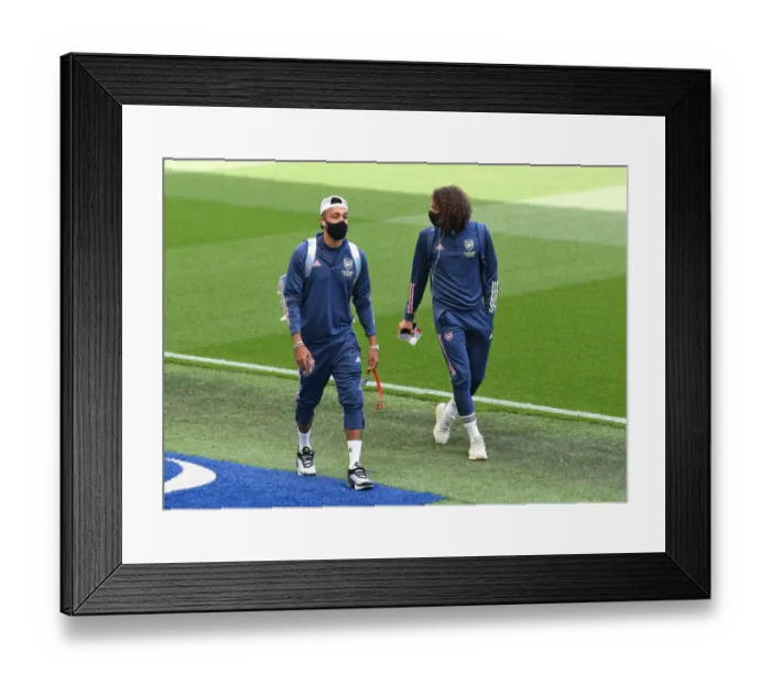 Framed Print : Arsenal Players Pierre-Emerick Aubameyang and Matteo Guendouzi Arrive at Brighton & Hove Albion Stadium for Premier League Match (2020)