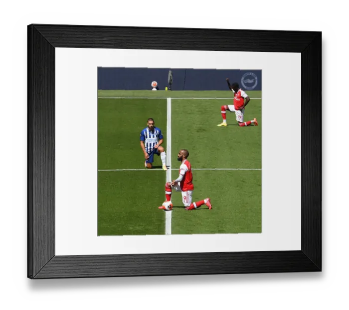 Framed Print : Arsenal's Alexandre Lacazette Takes a Knee During Brighton & Hove Albion Match Framed Print : Arsenal's Alexandre Lacazette Takes a Knee During Brighton & Hove Albion Match