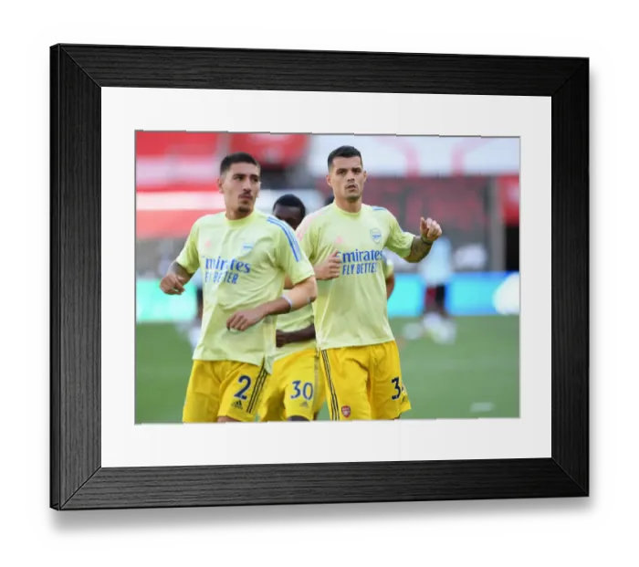 Framed Print : Arsenal's Granit Xhaka Warming Up Ahead of Southampton Clash (Southampton v Arsenal 2019-20)
