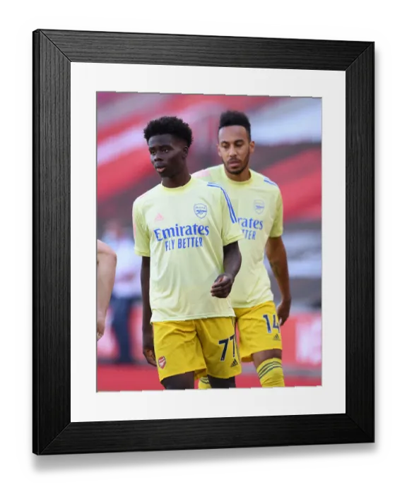Framed Print : Arsenal's Bukayo Saka Warming Up Ahead of Southampton Clash (Southampton v Arsenal 2019-20) Framed Print : Arsenal's Bukayo Saka Warming Up Ahead of Southampton Clash (Southampton v Arsenal 2019-20)