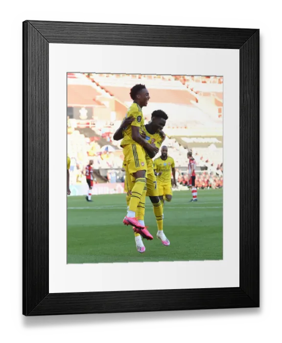 Framed Print : Joe Willock and Bukayo Saka Celebrate Arsenal's Winning Goals Against Southampton (2019-20)