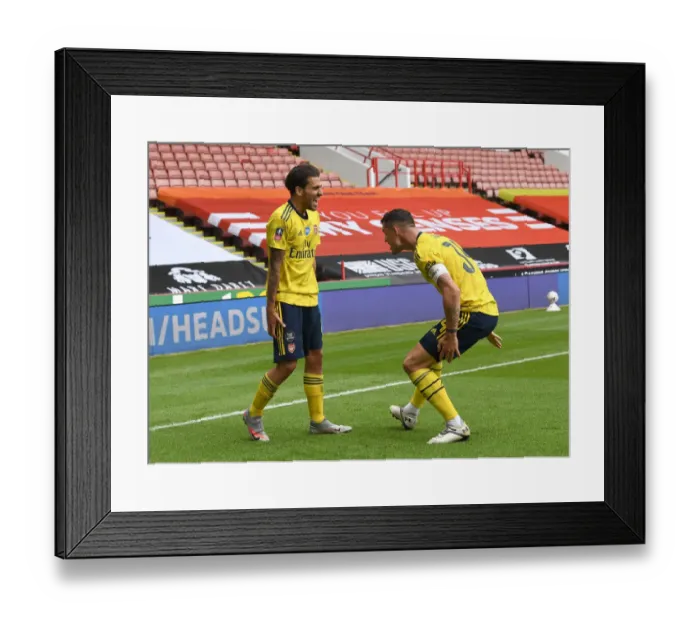 Framed Print : Dani Ceballos and Granit Xhaka Celebrate Arsenal's FA Cup Quarterfinal Goals vs Sheffield United
