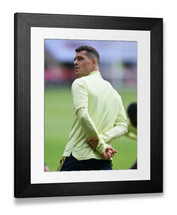 Framed Print : Granit Xhaka Gears Up: Arsenal's Quarter Final Showdown vs Sheffield United (FA Cup 2019-20)