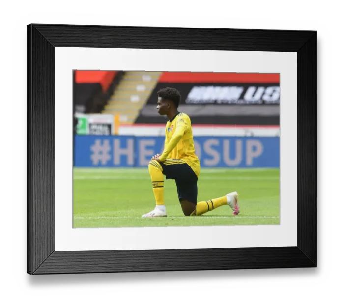 Framed Print : Arsenal's Bukayo Saka Takes a Knee before FA Cup Quarterfinal vs Sheffield United