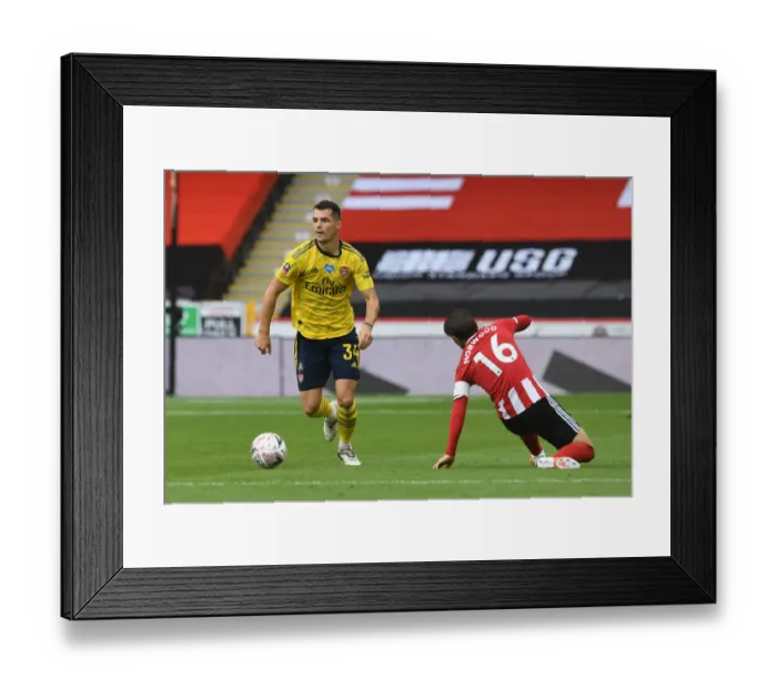 Framed Print : Granit Xhaka Leads Arsenal in FA Cup Clash against Sheffield United Framed Print : Granit Xhaka Leads Arsenal in FA Cup Clash against Sheffield United