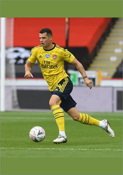Granit Xhaka in Action: Arsenal's FA Cup Victory over Sheffield United
