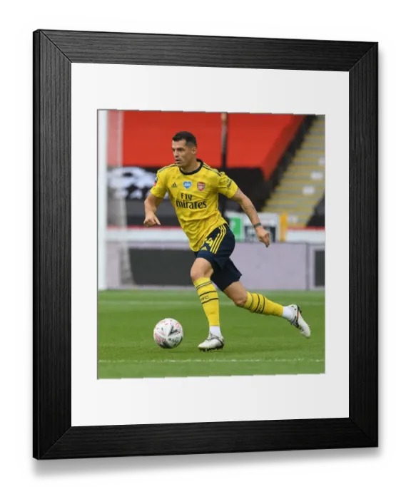 Framed Print : Granit Xhaka in Action: Arsenal's FA Cup Victory over Sheffield United