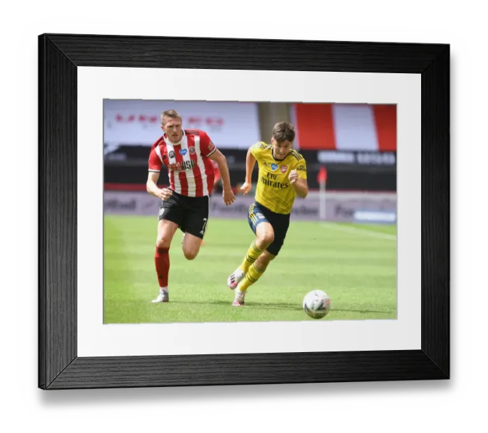 Framed Print : Arsenal's Kieran Tierney Clashes with John Lundstram in FA Cup Quarterfinal Battle