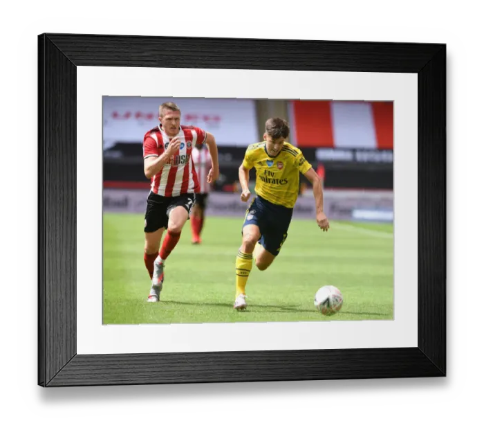 Framed Print : Arsenal's Kieran Tierney Clashes with John Lundstram in FA Cup Quarterfinal Battle