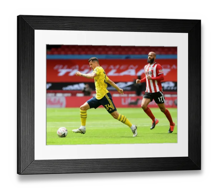 Framed Print : Granit Xhaka vs. David McGoldrick: FA Cup Quarterfinal Showdown - Sheffield United vs. Arsenal Framed Print : Granit Xhaka vs. David McGoldrick: FA Cup Quarterfinal Showdown - Sheffield United vs. Arsenal