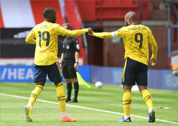 Arsenal's Nicolas Pepe and Alexandre Lacazette Celebrate Goal in FA Cup Quarterfinal vs Sheffield United