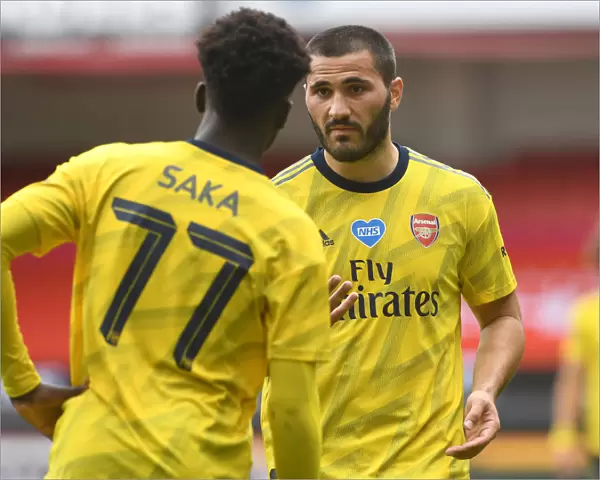Arsenal's Kolasinac and Saka in Deep Conversation during FA Cup Quarterfinal vs Sheffield United
