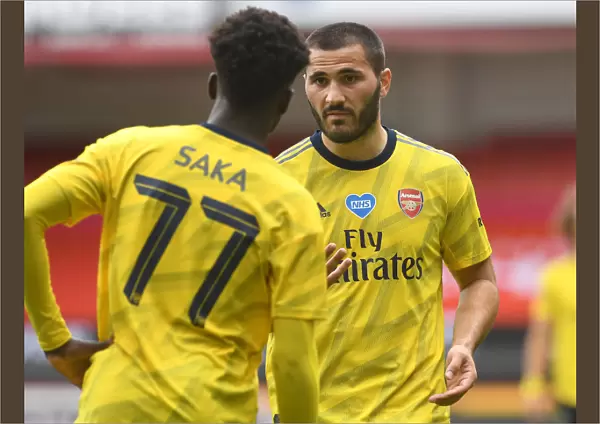 Arsenal's Kolasinac and Saka in Deep Conversation during FA Cup Quarterfinal vs Sheffield United