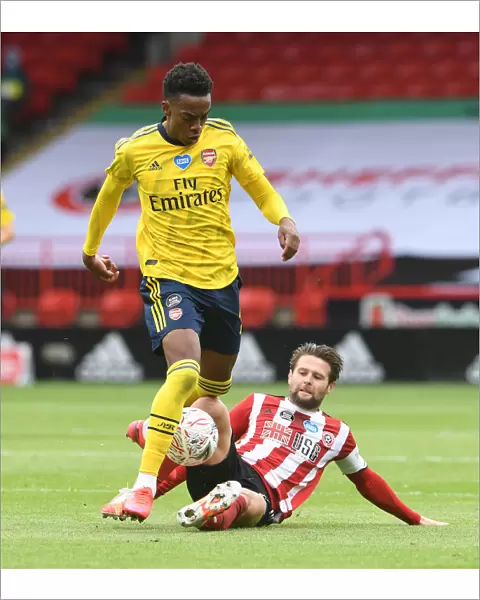 FA Cup Quarterfinal Battle: Joe Willock vs. Ollie Norwood - Arsenal vs. Sheffield United (2019-20)