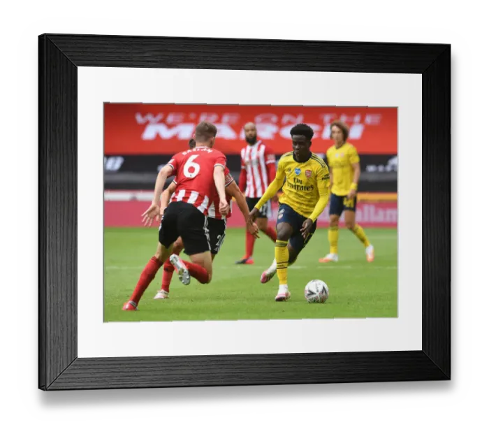 Framed Print : Bukayo Saka vs. Chris Basham: FA Cup Quarterfinal Showdown - Sheffield United vs. Arsenal