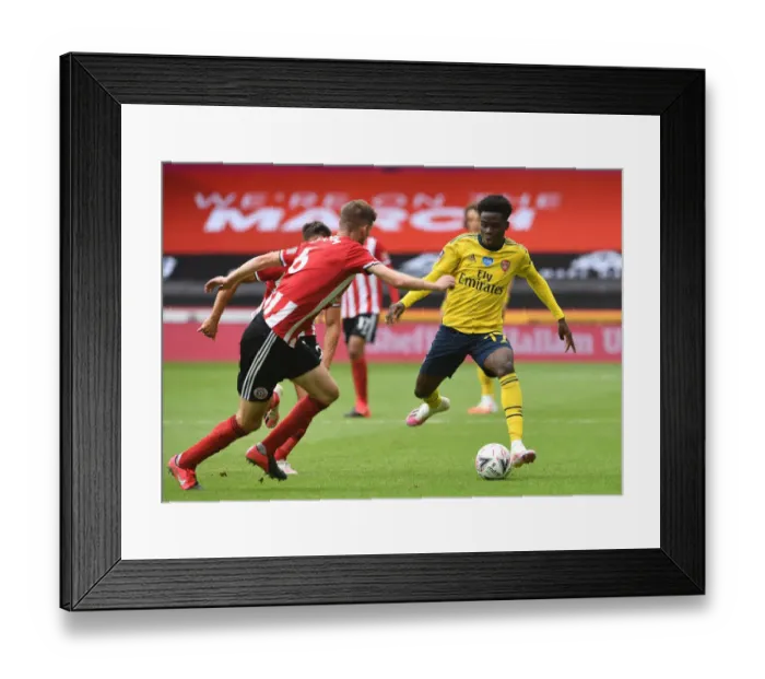Framed Print : Saka vs. Basham: FA Cup Showdown - Sheffield United vs. Arsenal