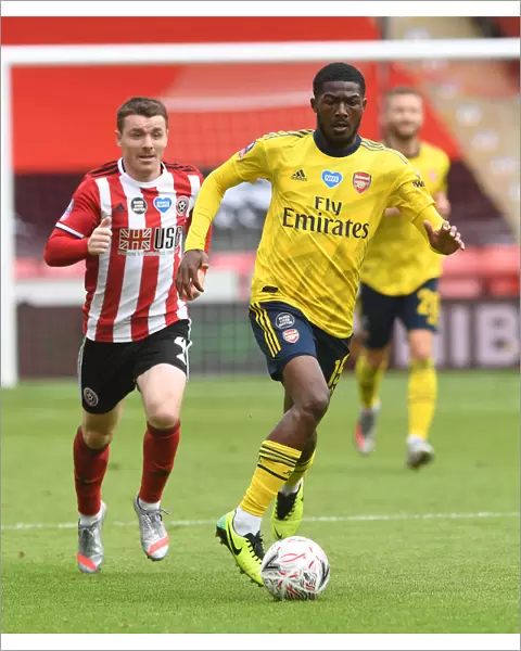 Ainsley Maitland-Niles in Action: Arsenal's FA Cup Quarterfinal Battle against Sheffield United