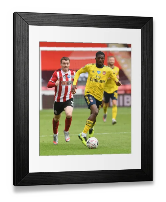 Framed Print : Ainsley Maitland-Niles in Action: Arsenal's FA Cup Quarterfinal Battle against Sheffield United