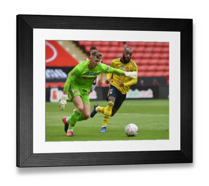 Framed Print : Arsenal's Lacazette Closes In on Sheffield United's Henderson in FA Cup Quarterfinal Showdown