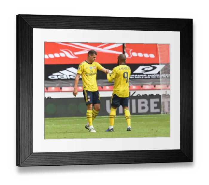 Framed Print : Arsenal's Lacazette Hands Captains Armband to Xhaka in FA Cup Quarterfinal vs Sheffield United Framed Print : Arsenal's Lacazette Hands Captains Armband to Xhaka in FA Cup Quarterfinal vs Sheffield United