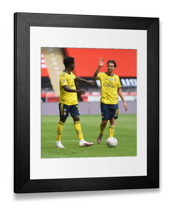 Framed Print : Arsenal's Bukayo Saka and Dani Ceballos Celebrate FA Cup Quarterfinal Victory over Sheffield United Framed Print : Arsenal's Bukayo Saka and Dani Ceballos Celebrate FA Cup Quarterfinal Victory over Sheffield United