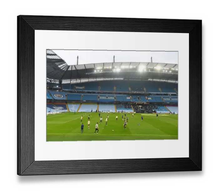 Framed Print : Premier League Showdown: Arsenal vs Manchester City - Warm-Up at Etihad Stadium Framed Print : Premier League Showdown: Arsenal vs Manchester City - Warm-Up at Etihad Stadium