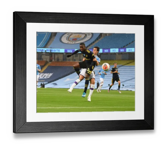 Framed Print : Eddie Nketiah vs Eric Garcia: Intense Battle in Manchester City vs Arsenal FC Premier League Clash (2019-20) Framed Print : Eddie Nketiah vs Eric Garcia: Intense Battle in Manchester City vs Arsenal FC Premier League Clash (2019-20)
