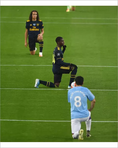 Arsenal's Nketiah Kneels Before Manchester City: Premier League Showdown (2019-20)