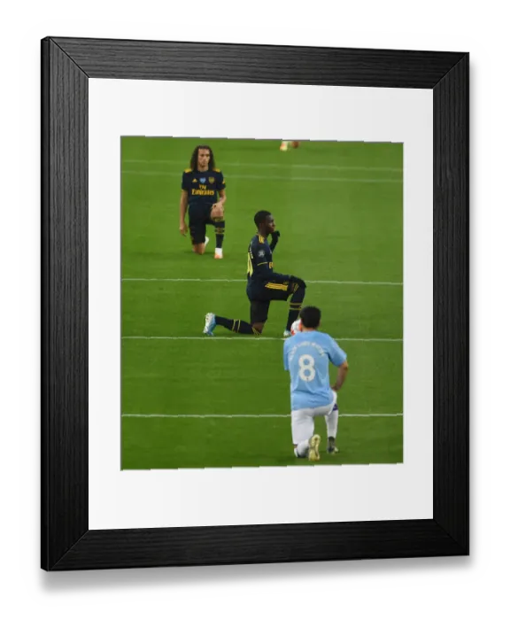 Framed Print : Arsenal's Eddie Nketiah Kneels Before Manchester City Match, Premier League 2019-2020