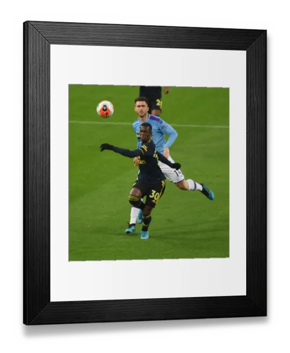 Framed Print : Arsenal's Eddie Nketiah Outmaneuvers Man City's Aymeric Laporte in Premier League Clash (Manchester City vs Arsenal 2019-20) Framed Print : Arsenal's Eddie Nketiah Outmaneuvers Man City's Aymeric Laporte in Premier League Clash (Manchester City vs Arsenal 2019-20)