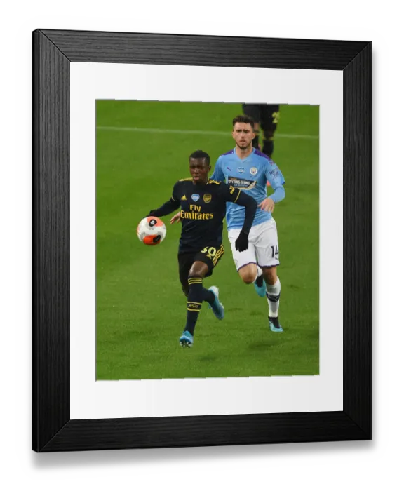 Framed Print : Arsenal's Eddie Nketiah Outwits Laporte: Premier League Upset as Arsenal Triumphs Over Manchester City (2019-20)