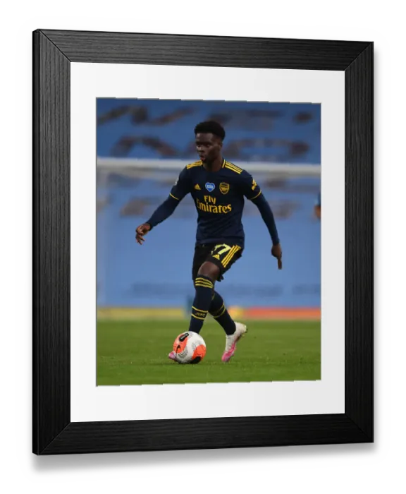 Framed Print : Bukayo Saka's Breakthrough Performance: Manchester City vs. Arsenal, Premier League 2019-2020