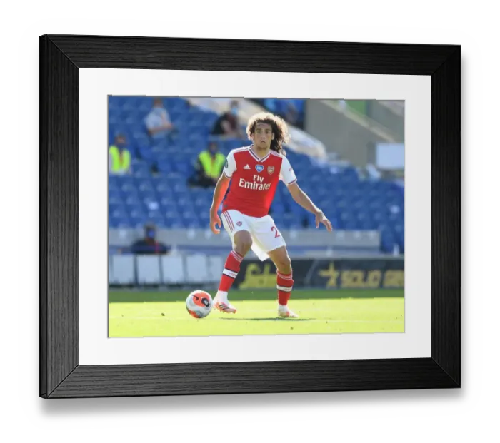 Framed Print : Arsenal's Guendouzi Plays On: Empty Premier League Match Amidst Coronavirus Pandemic Framed Print : Arsenal's Guendouzi Plays On: Empty Premier League Match Amidst Coronavirus Pandemic