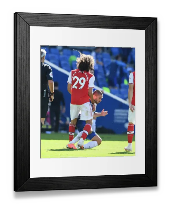 Framed Print : Clash at the Community Stadium: Brighton vs. Arsenal in Empty Premier League Match Framed Print : Clash at the Community Stadium: Brighton vs. Arsenal in Empty Premier League Match
