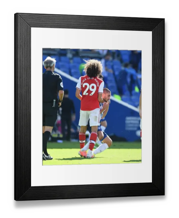 Framed Print : Brighton vs. Arsenal: Clash Between Guendouzi and Maupay Amid Empty Stadiums (2019-20)