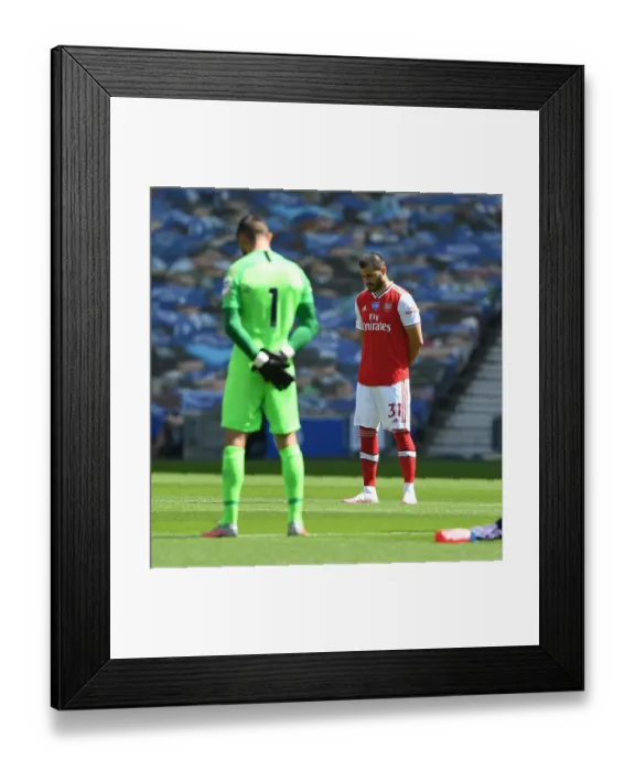 Framed Print : Empty Stands: Sead Kolasinac Honors Silence at Brighton vs. Arsenal (2019-20) Framed Print : Empty Stands: Sead Kolasinac Honors Silence at Brighton vs. Arsenal (2019-20)