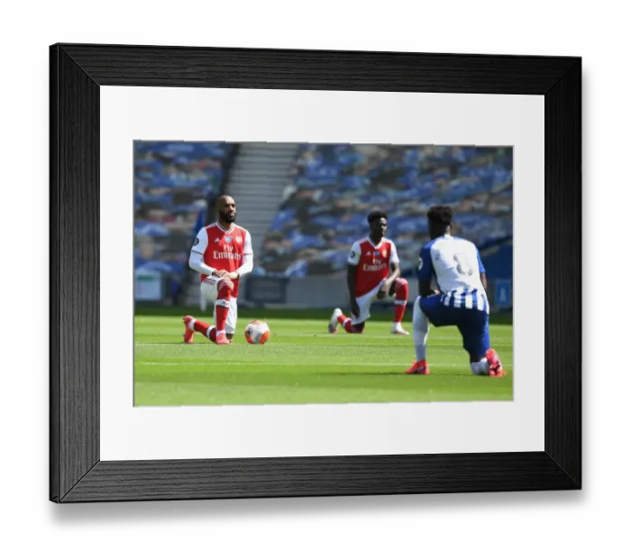 Framed Print : Arsenal's Alex Lacazette Takes a Knee at Empty Brighton Stadium - Premier League 2019-2020 Framed Print : Arsenal's Alex Lacazette Takes a Knee at Empty Brighton Stadium - Premier League 2019-2020