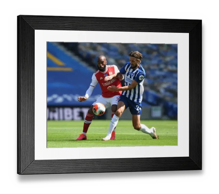 Framed Print : Brighton vs. Arsenal: Empty Stadium Clash in Premier League Amidst Coronavirus Pandemic - Lacazette vs. Propper Framed Print : Brighton vs. Arsenal: Empty Stadium Clash in Premier League Amidst Coronavirus Pandemic - Lacazette vs. Propper