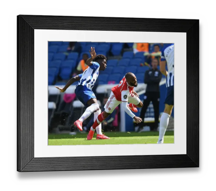Framed Print : Brighton vs. Arsenal: Empty Stadium Clash - Lacazette Fouls Bissouma Framed Print : Brighton vs. Arsenal: Empty Stadium Clash - Lacazette Fouls Bissouma