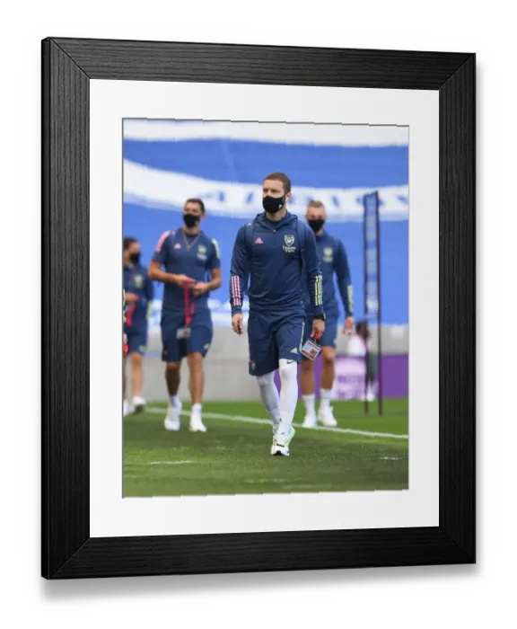 Framed Print : Arsenal's Mustafi Prepares for Empty Brighton Clash in Pandemic-hit Premier League