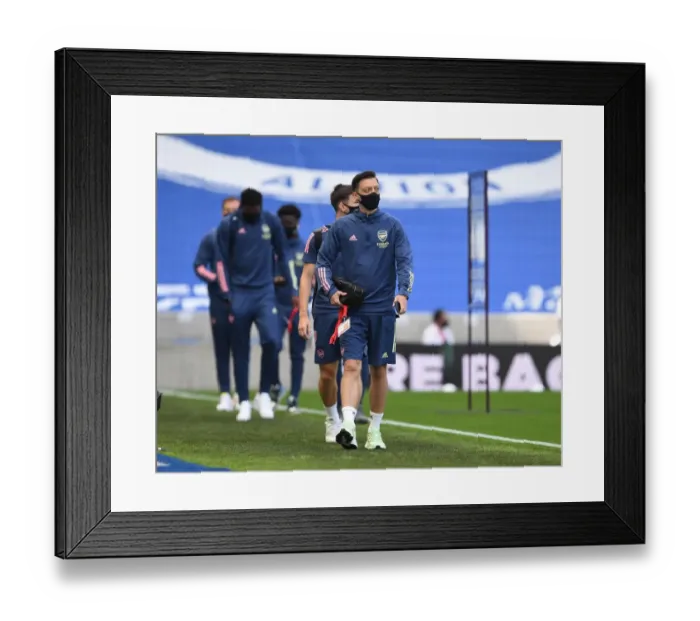 Framed Print : Empty Stands: Mesut Ozil Prepares for Brighton vs. Arsenal in Premier League Amidst Coronavirus Pandemic Framed Print : Empty Stands: Mesut Ozil Prepares for Brighton vs. Arsenal in Premier League Amidst Coronavirus Pandemic