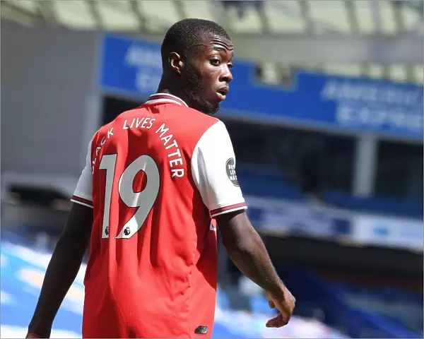 Empty Stands: Nicolas Pepe of Arsenal in Action against Brighton & Hove Albion (2020)