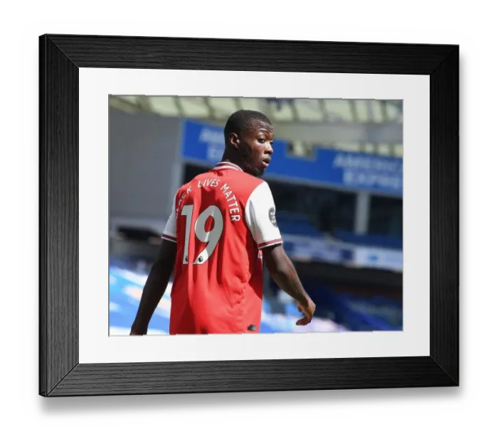 Framed Print : Empty Stands: Nicolas Pepe of Arsenal in Action against Brighton & Hove Albion (2020) Framed Print : Empty Stands: Nicolas Pepe of Arsenal in Action against Brighton & Hove Albion (2020)