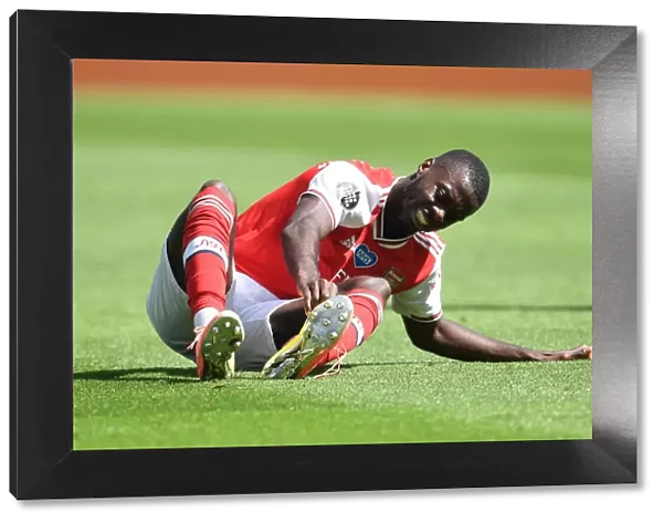 Brighton vs. Arsenal: Pepe Suffers Injury in Empty Premier League Clash (2020)